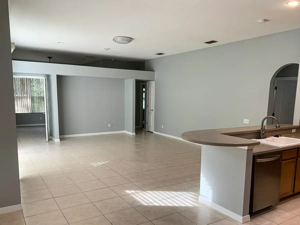 Interior painting for Tampa rental property with fresh neutral walls and clean cut lines